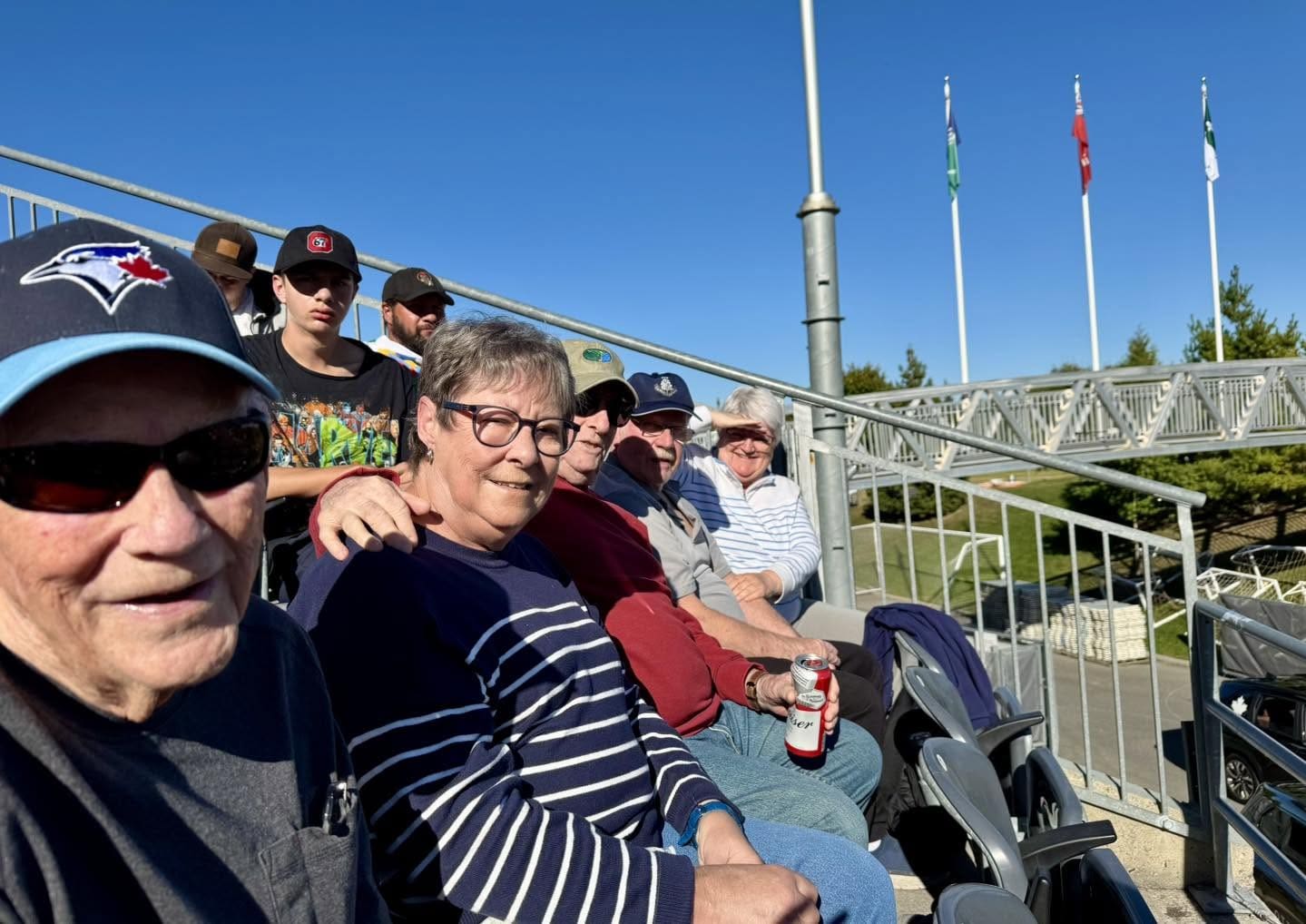 An elderly man and woman smile.