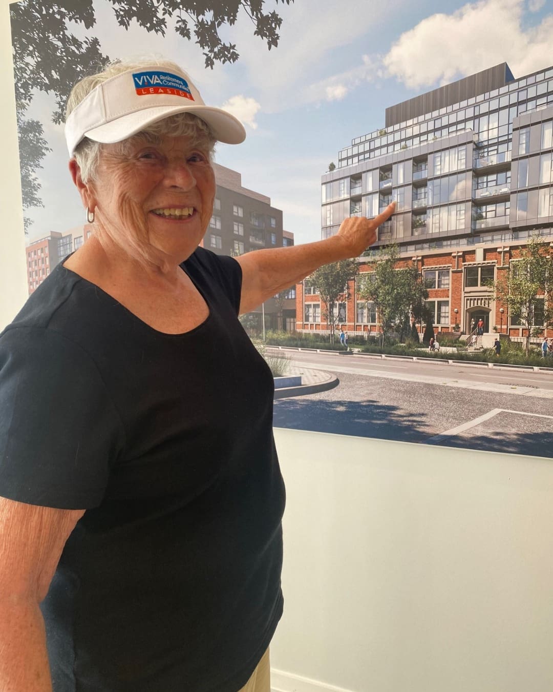 An elderly woman smiles.