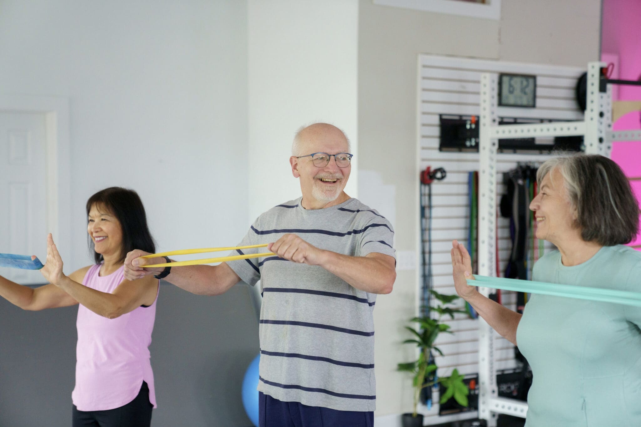 Older adults participating in a group fitness class as part of an active retirement living lifestyle.